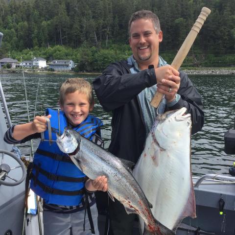 a person holding a fish