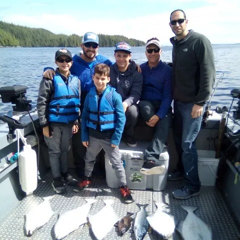 a group of people posing for the camera