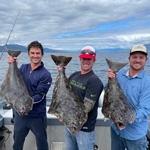 a group of people posing for the camera